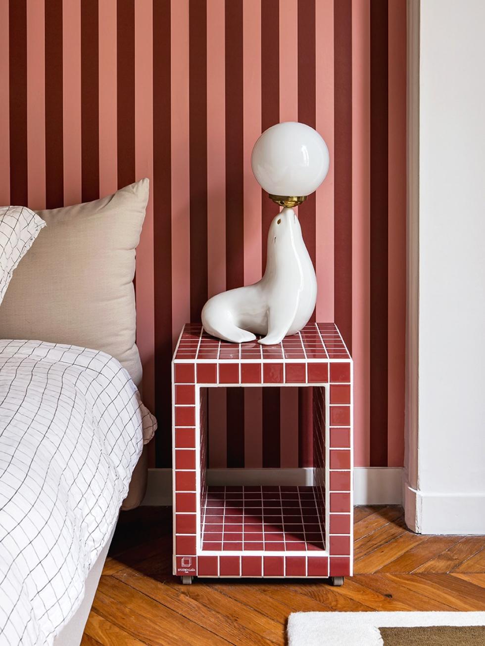 Lisa's nightstand, with her famous sea lion lamp.