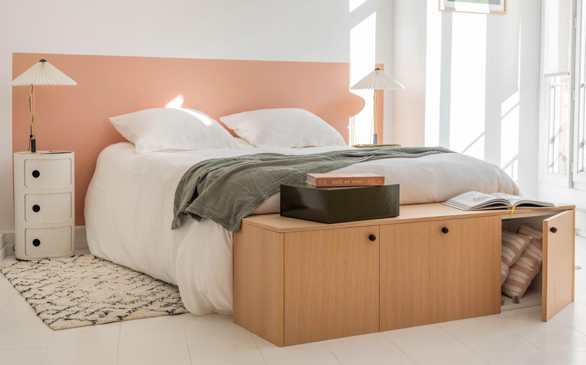 A natural oak bed end by Plum Living